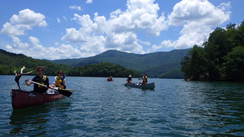 Campers participating in Backcountry Ecological Expedition with Tremont Institute canoe on Fontana Lake