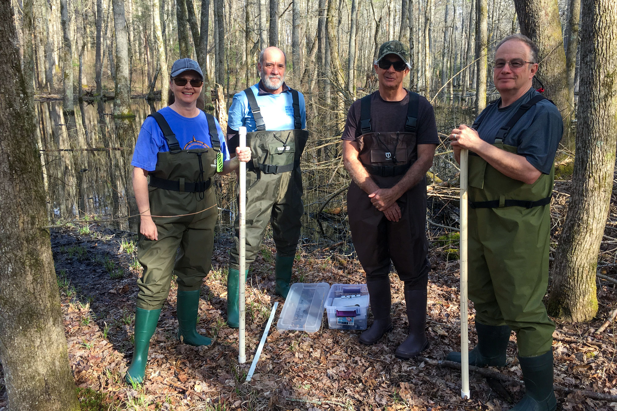 Community science volunteers pose for a photo after monitoring vernal ponds for vernal pond breeding amphibians in the Smokies
