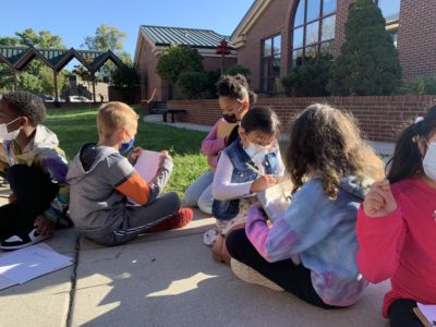 Students at Christenberry Elementary pay attention to nature during their Pocket Worlds activity.